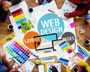 Web design elements on a table with group surrounding