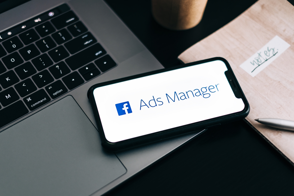 phone with facebook ad manager open